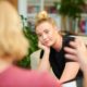 psychotherapist talking to female patient