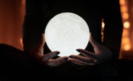psychic holding crystal ball