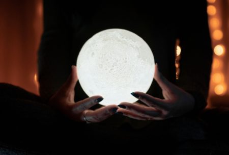 psychic holding crystal ball