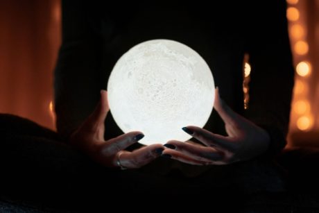 psychic holding crystal ball