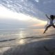 woman leaping in happiness