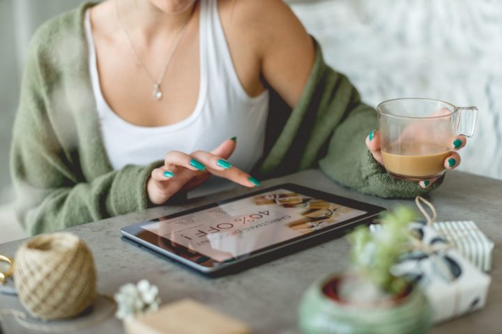 woman making powerpoint in tablet device