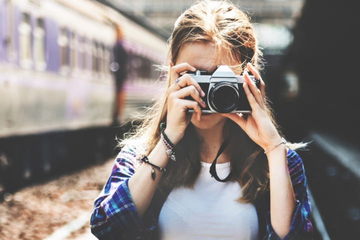 woman holding camera