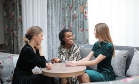 women talking to each other