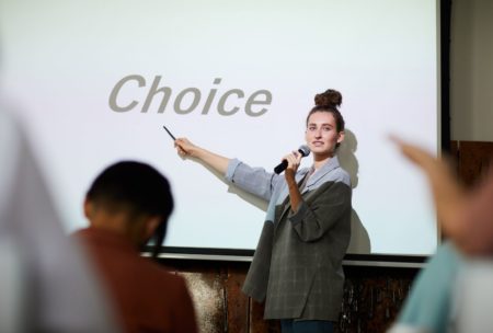 woman making presentation about choice