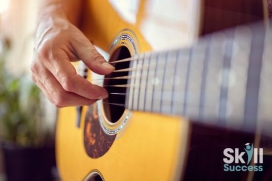 Learn to play the acoustic guitar in just 30 minutes per week. Practice videos included!