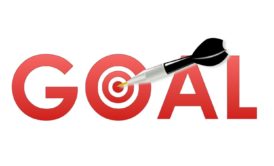 a dart successfully hitting the word goal against a white backdrop, representing the concept of goal setting mastery