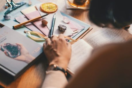 woman writing in journal