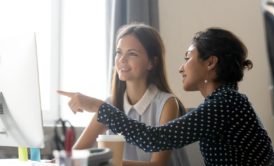 teacher talking to female student