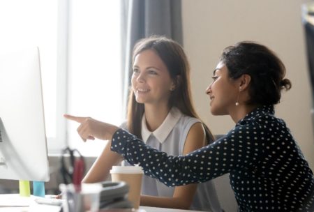teacher talking to female student