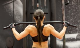 woman in black sports bra working out