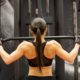 woman in black sports bra working out