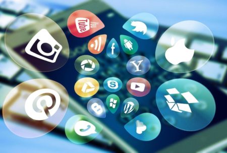 a smartphone filled with diverse social media icons, representing a social media design course
