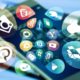 a smartphone filled with diverse social media icons, representing a social media design course
