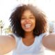 happy woman in white shirt