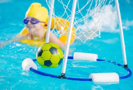 child in swimming lesson