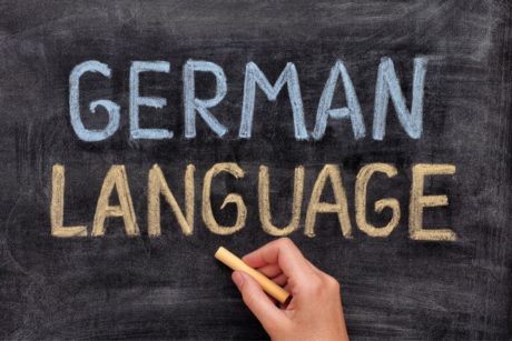German for Beginners concept with German Language chalked on a blackboard, indicating a start to learning German