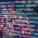 a blurred computer screen displaying various types of code, related to a Linux Ubuntu course