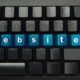 A keyboard with the word 