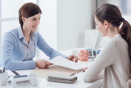 women discussing financial plan