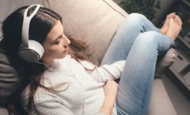 woman listening to relaxing music