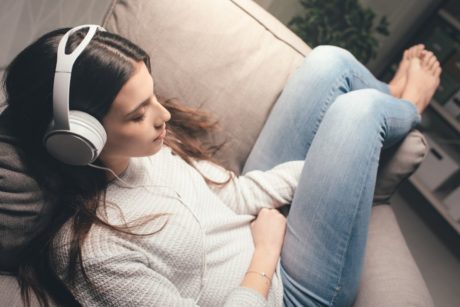 woman listening to relaxing music