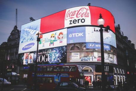 a creative marketing strategy featuring a large billboard with coca cola logo