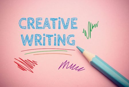 Creative Writing displayed on a pink background, showcasing artistic expression and imagination in creative writing class