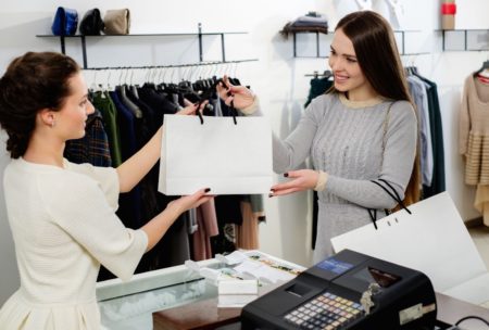 female customer buys bag