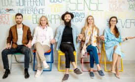people sitting on chairs with words on them promoting be happier with positive psychology