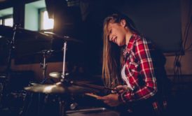 woman playing the drums