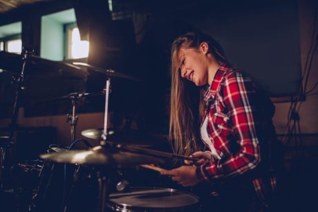 woman playing the drums