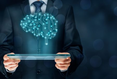 man in suit holding plate projecting a human brain