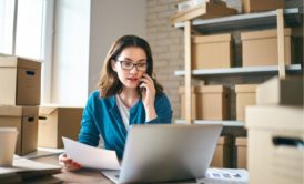 female ecommerce entrepreneur talking on phone