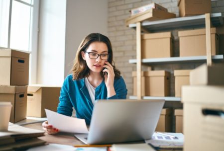 female ecommerce entrepreneur talking on phone