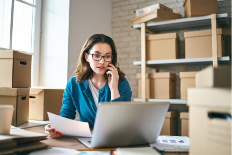 female ecommerce entrepreneur talking on phone