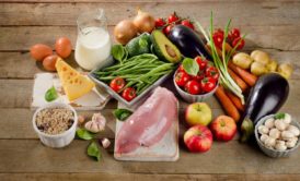 nutrition course for beginners highlighting a balanced diet with protein-rich chicken, fresh vegetables, eggs, and dairy milk