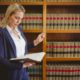 a lawyer reviewing legal texts in a law library, boosting your productivity through focused research and study