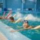 children having swimming lessons