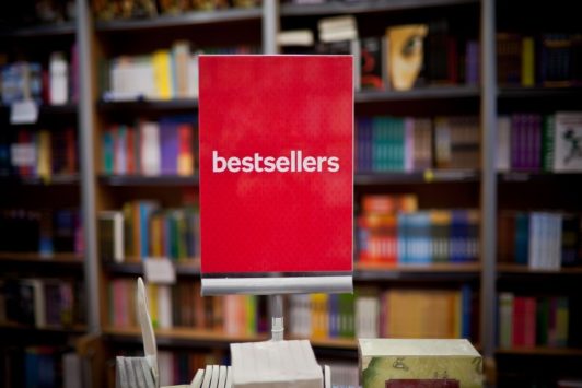 red book titled bestsellers