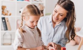 mother and daughter playing