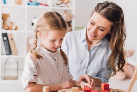 mother and daughter playing