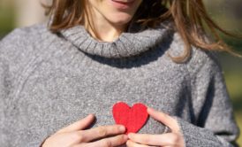 woman wearing grey sweater