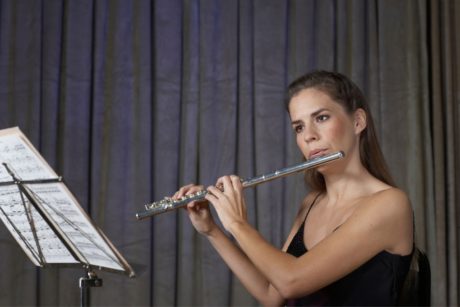 woman playing the flute