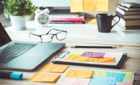 laptop notes eyeglasses