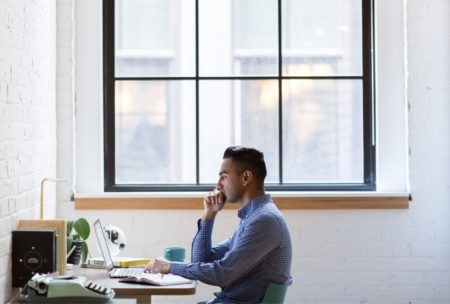 man working on desk