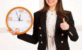 woman holding wall clock