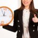 woman holding wall clock