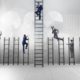 people climbing ladders