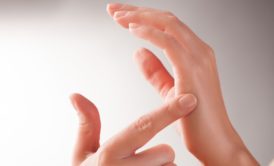 woman tapping hands